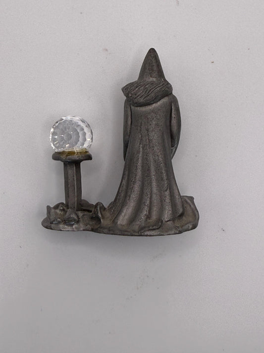 A vintage miniature mini solid pewter wizard with crystal ball figure
