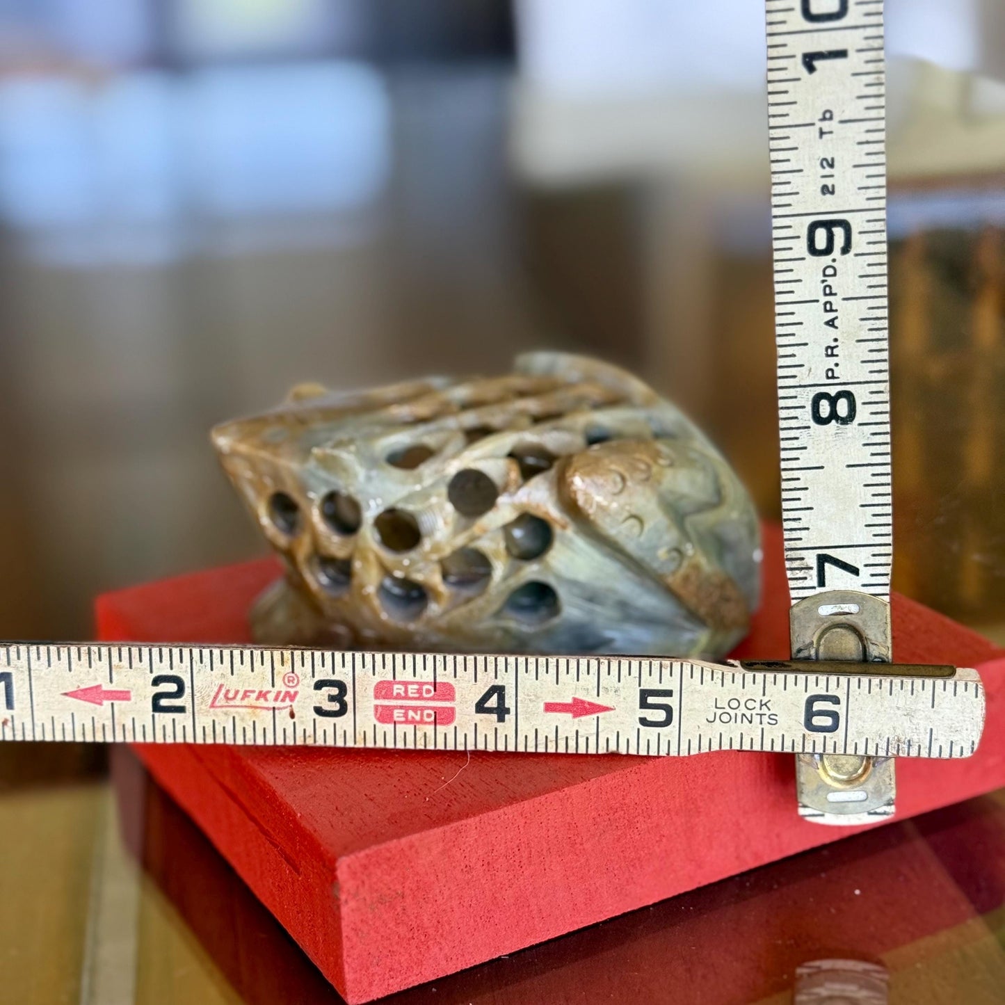 A Hand Carved Soap Stone Frog Inside Frog Art Paperweight