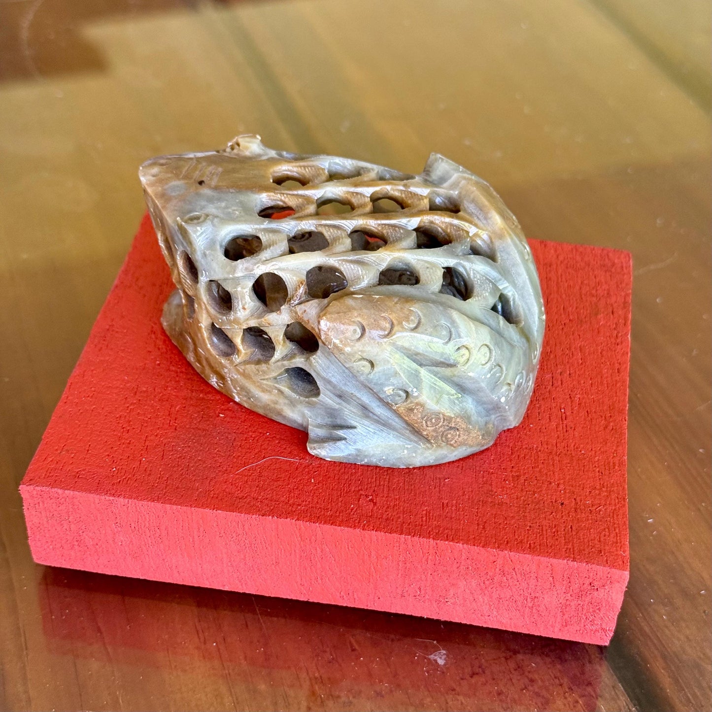 A Hand Carved Soap Stone Frog Inside Frog Art Paperweight