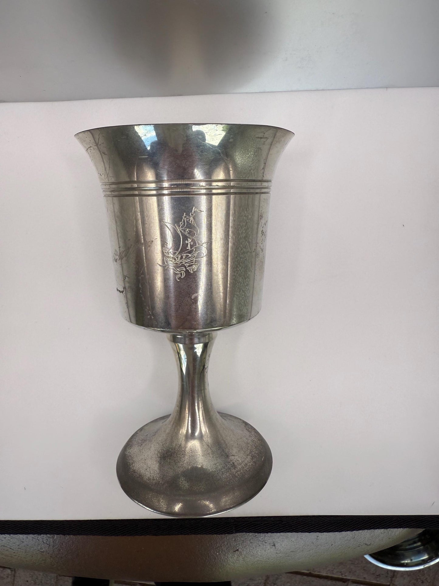 An antique pewter silver chalice goblet