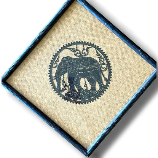 An artisan hand made Thai artist cut leather elephant embroidered on weaved hemp