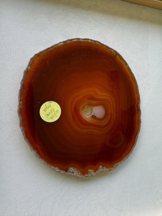 A carnelian red rust amber Brazilian Agate Slice