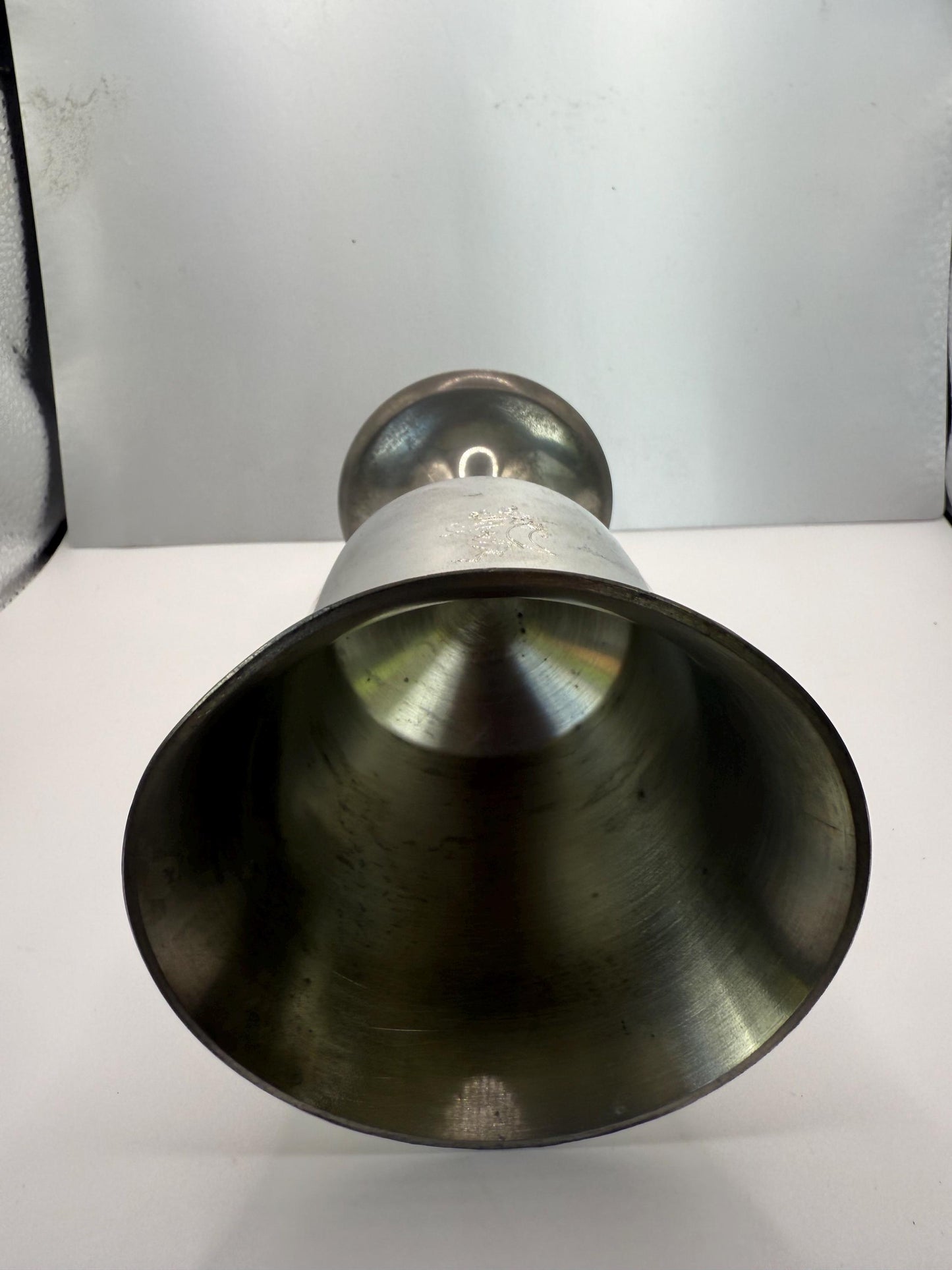 An antique pewter silver chalice goblet