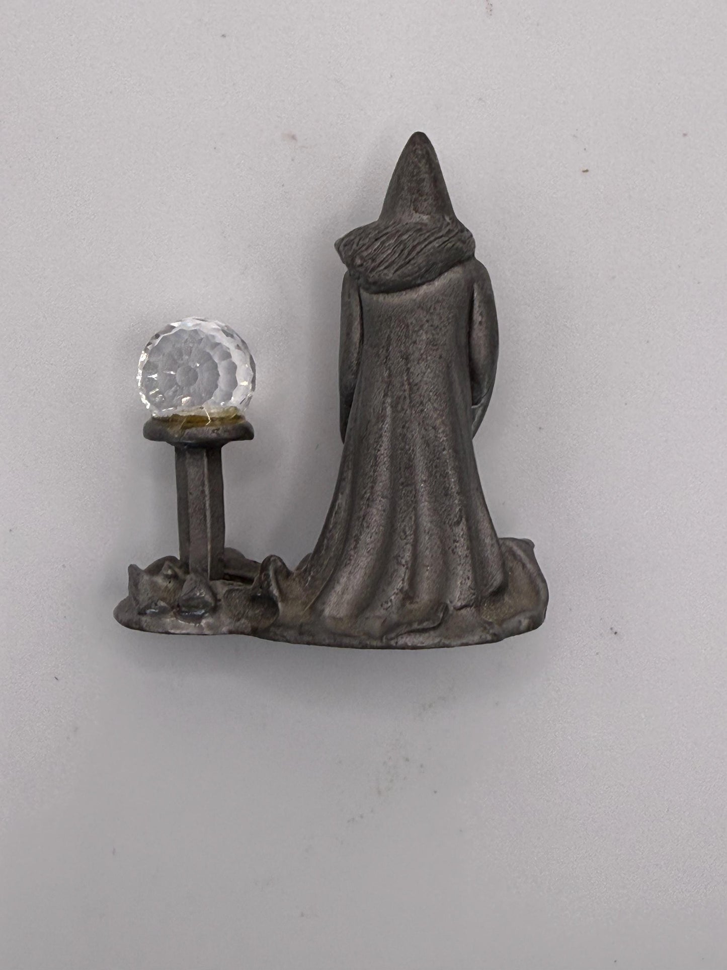 A vintage miniature mini solid pewter wizard with crystal ball figure