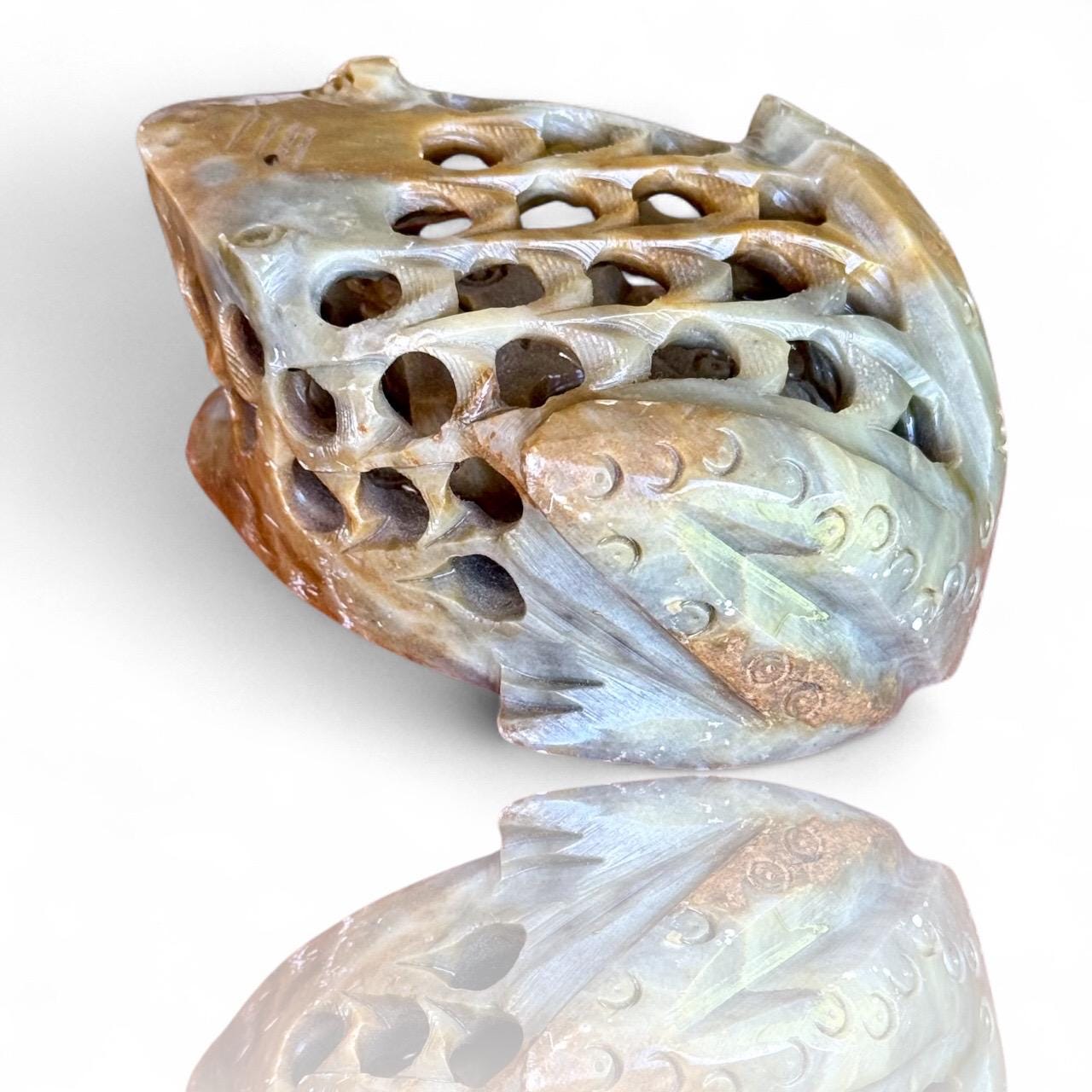 A Hand Carved Soap Stone Frog Inside Frog Art Paperweight