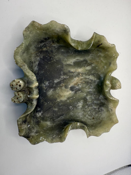 An old hand carved natural green jade ashtray with dice