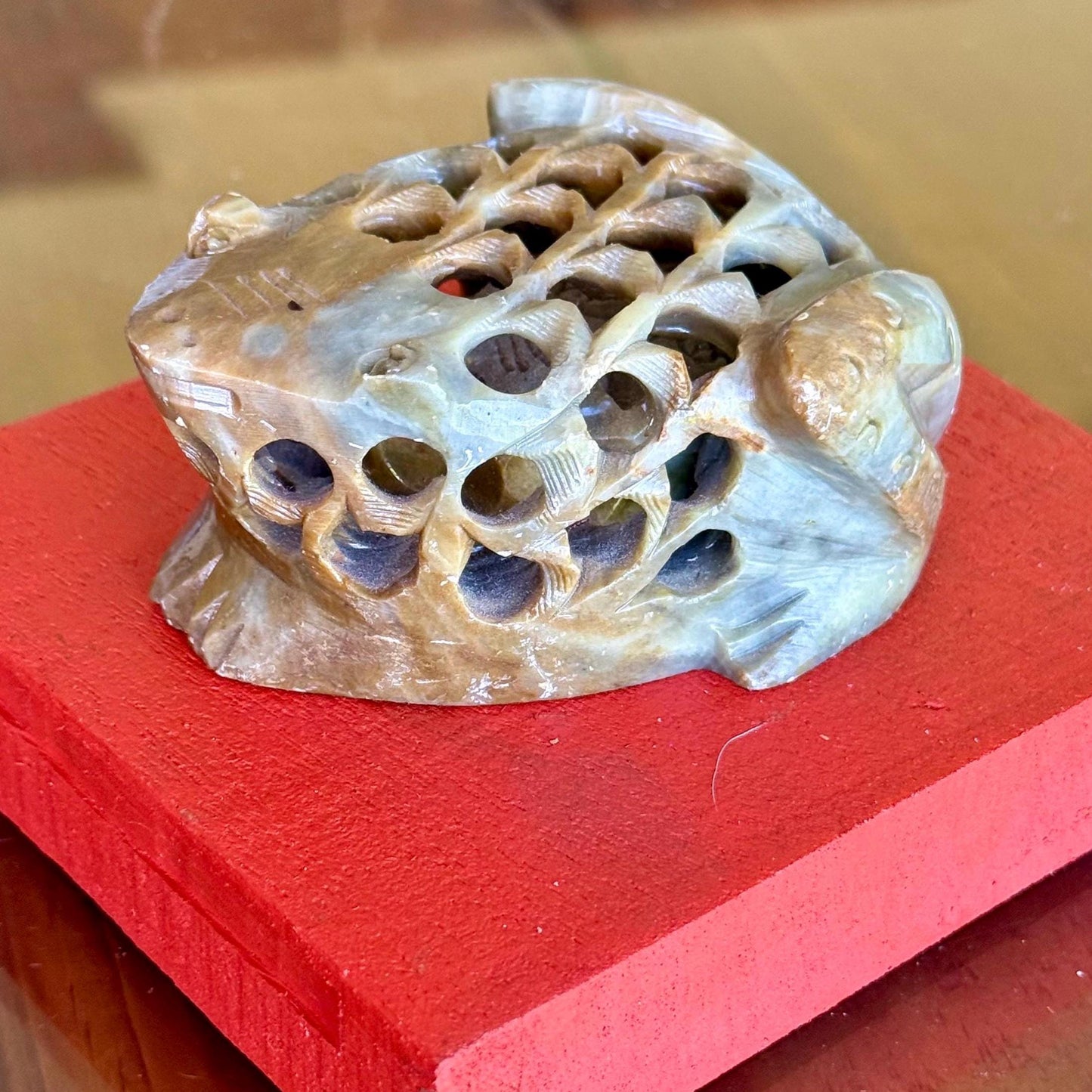 A Hand Carved Soap Stone Frog Inside Frog Art Paperweight