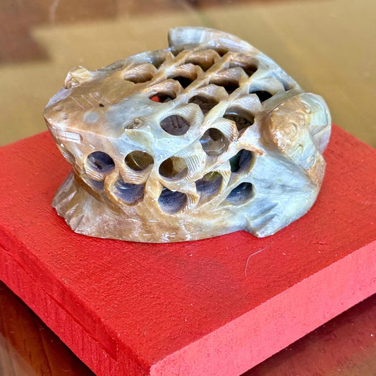 A Hand Carved Soap Stone Frog Inside Frog Art Paperweight