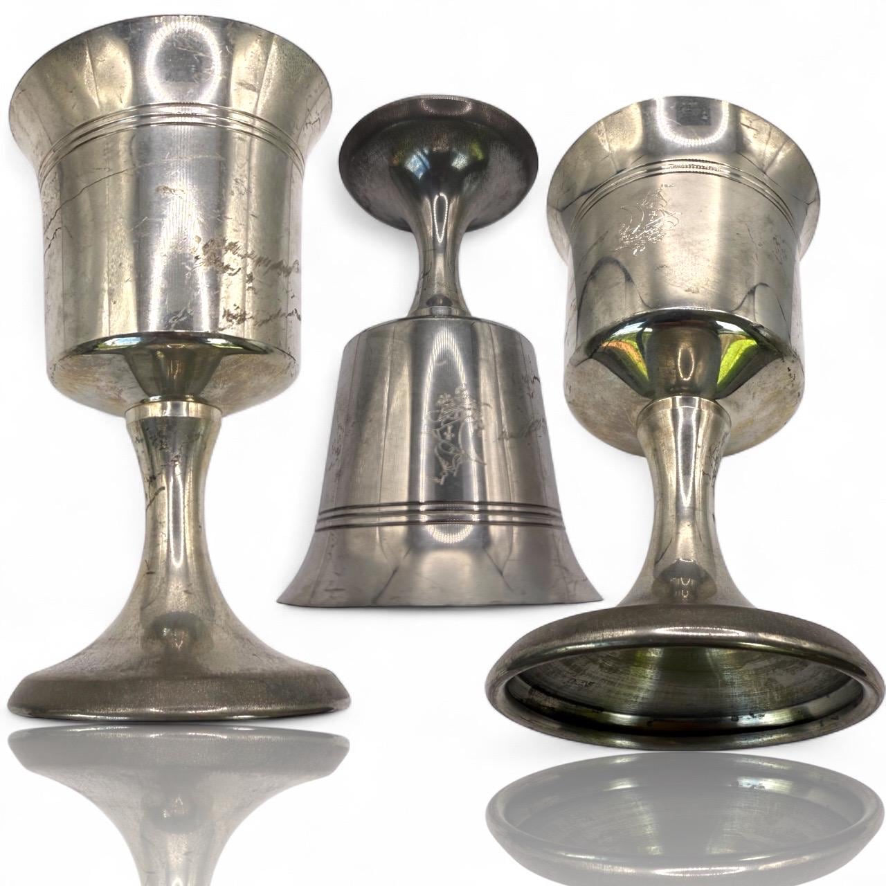 An antique pewter silver chalice goblet